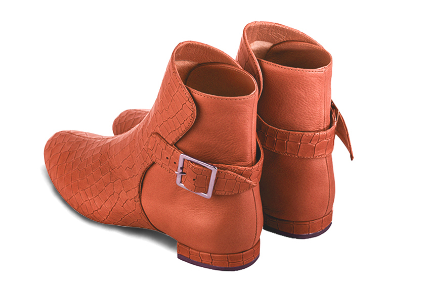 Terracotta orange women's ankle boots with buckles at the back. Round toe. Flat block heels. Rear view - Florence KOOIJMAN